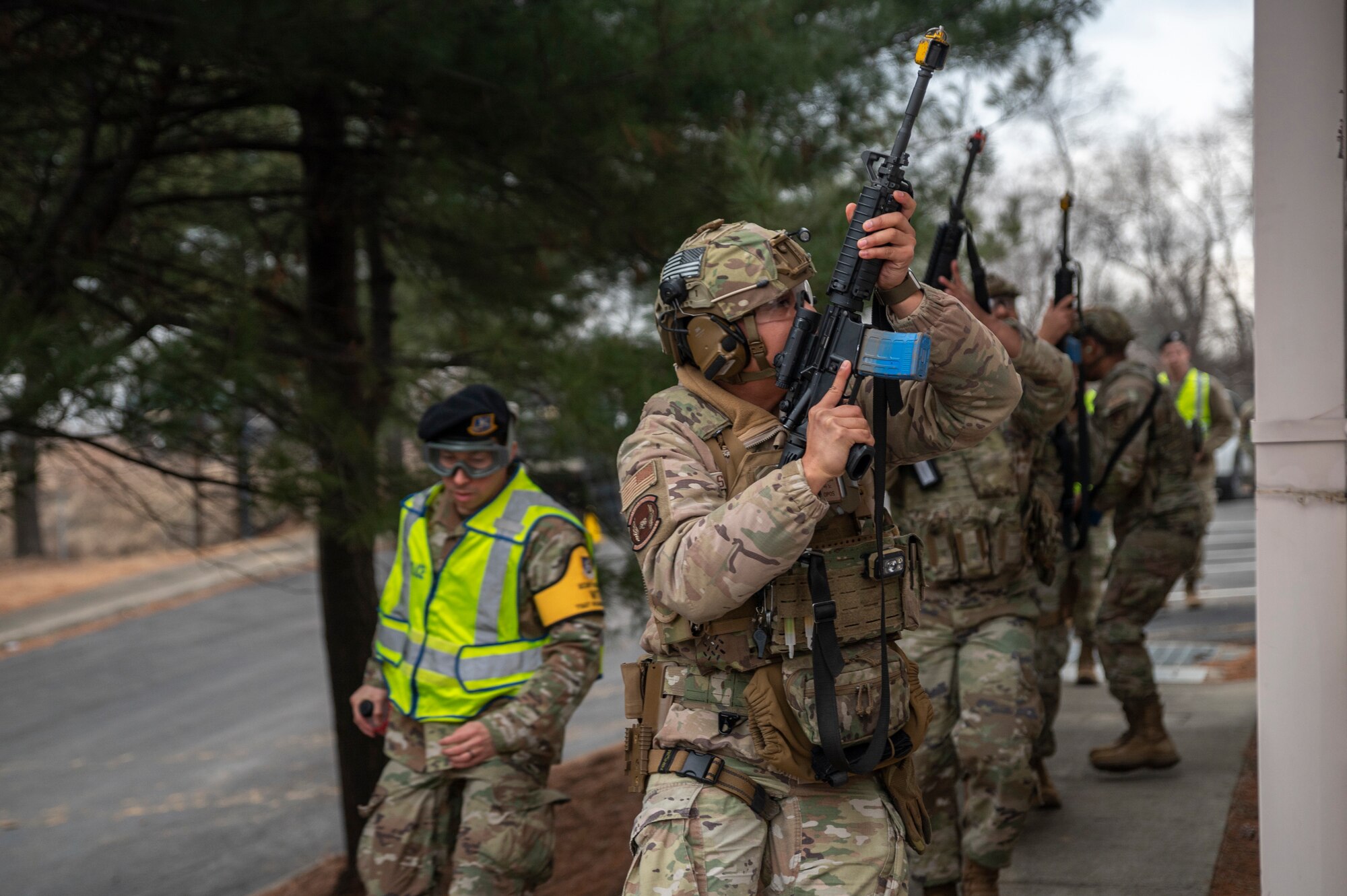 U.S. Airmen assigned to the 51st Security Forces Squadron prepare to enter a building during a simulated active shooter response training at Osan Air Base, Republic of Korea, Feb. 14, 2024. Quarterly contingency training plays a crucial role in maintaining the security and operational readiness of Osan AB. (U.S. Air Force photo by Senior Airman Trevor Gordnier)