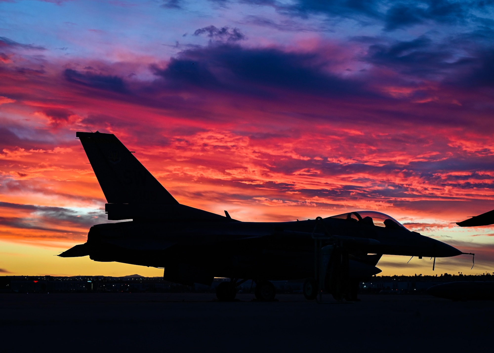 An F-16C Fighting Falcon assigned to the 79th Fighter Squadron sits ready on the flightline