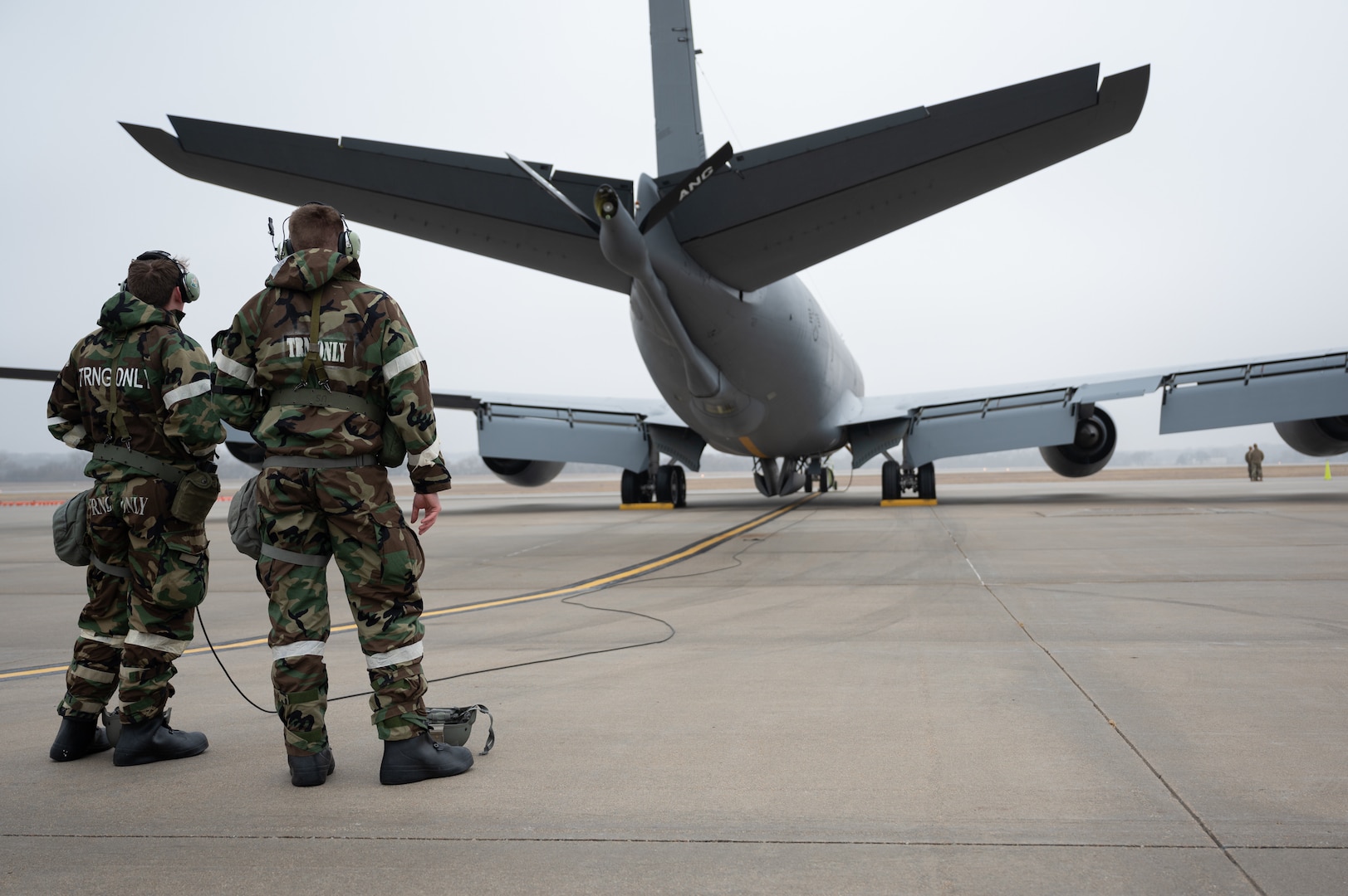 Crew chiefs from the 155th Air Refueling Wing, perform pre-flight checks of the KC-135 Stratotanker Feb. 4, 2024, National Guard airbase in Lincoln, Nebraska.