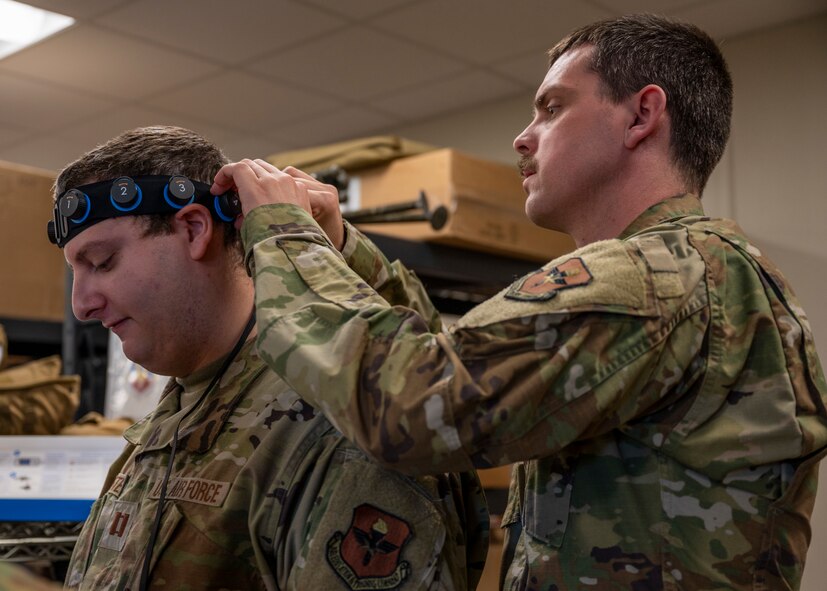 Airmen from the 59th Medical Wing practice detecting seizures during a national disaster response exercise on Camp Bramble at Joint Base San Antonio-Lackland, Texas, March 3, 2023. Texas A&M University has been conducting emergency response training for 15 years and, for the first time, collaborated with the 59th MDW. Being able to train inflight and utilize Disaster City by collaborating with Texas A&M gives medics a way to hone their skills, prepare for national emergencies and remain ready medics. (U.S. Air Force photo by Senior Airman Melody Bordeaux)