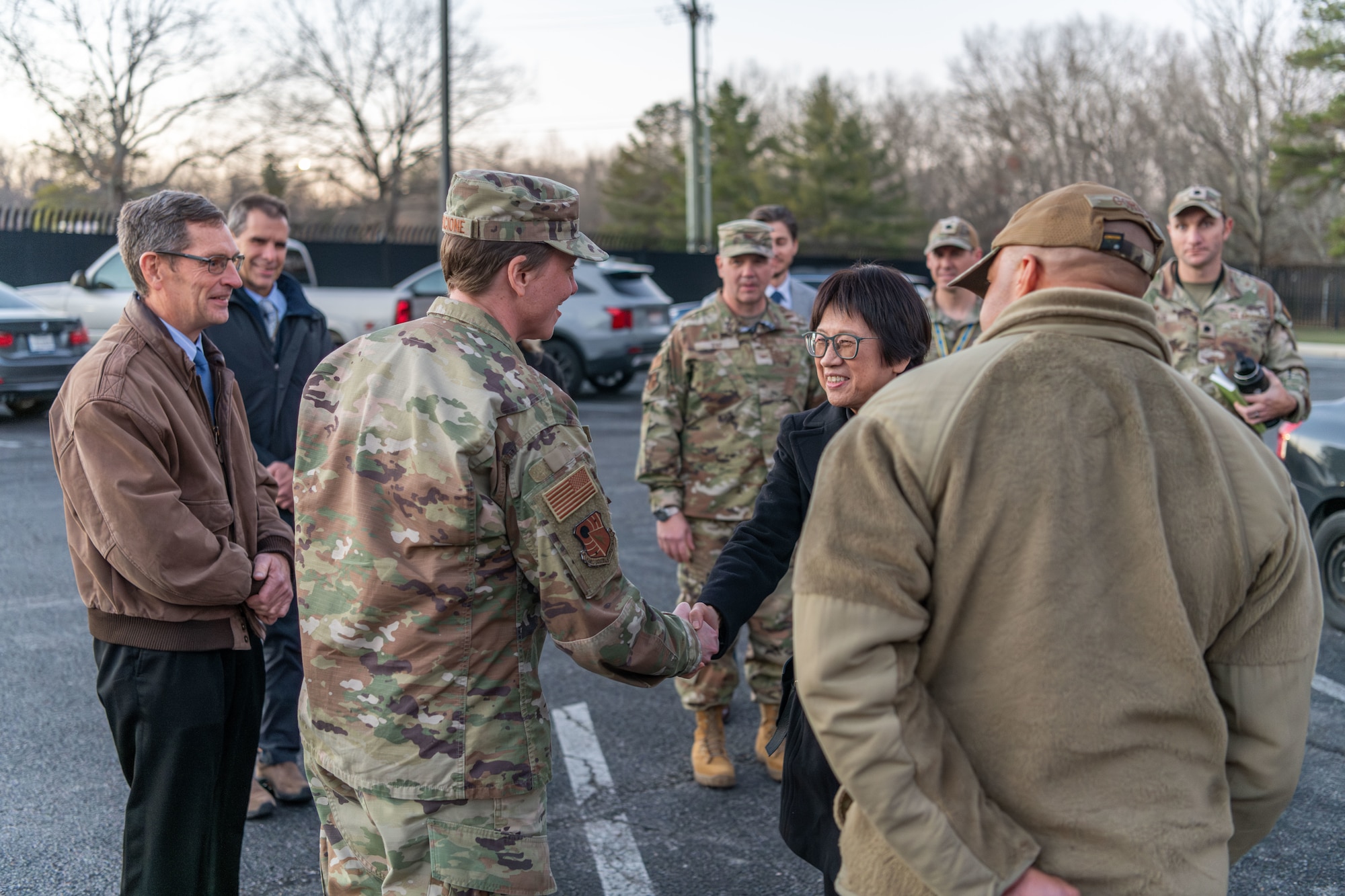 Heidi Shyu, Under Secretary of Defense for Research and Engineering, is greeted by Chief Master Sgt. Jennifer Cirricione, senior enlisted leader of Arnold Engineering Development Complex, and other installation leadership as she arrives for her Dec. 11, 2023, visit to Arnold Air Force Base, Tenn. During her visit to Arnold, headquarters of AEDC, Shyu toured several test facilities and was briefed on test capabilities at Arnold. (U.S. Air Force photo by Keith Thornburgh)