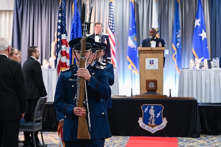 U.S. Air Force Academy Space Cadets present the colors during the Order of the Sword induction ceremony at the U.S. Air Force Academy, Colorado Springs, Colorado, Feb. 15, 2024. Dating back to the Middle Ages and adopted by the U.S. Air Force in 1967, the tradition of the Royal Order of the Sword is the highest honor the enlisted corps can bestow on a leader.