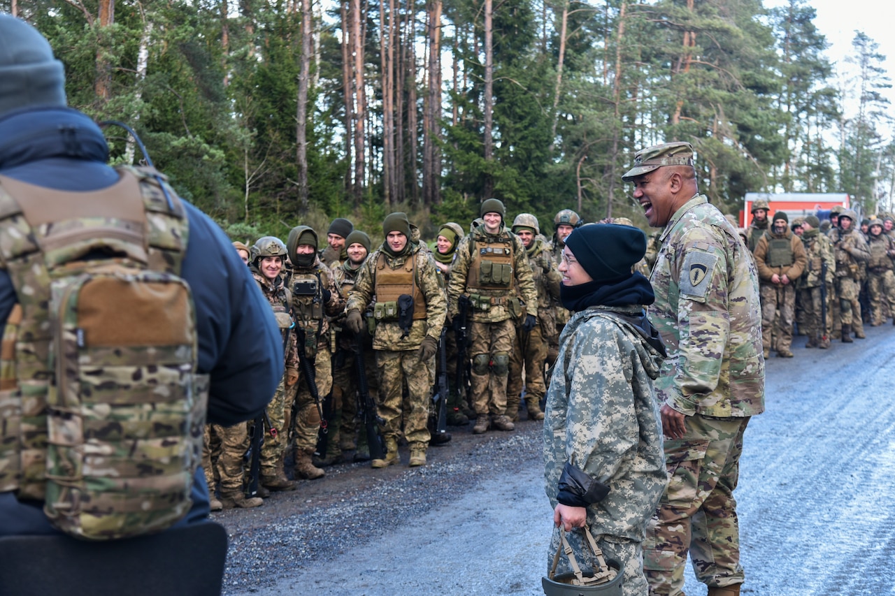 Soldiers are bundled up in the cold.