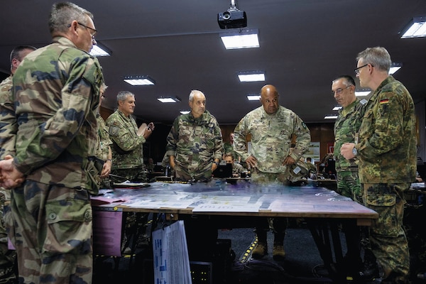 General Darryl Williams, commander of U.S. Army Europe and Africa and commander of NATO’s Allied Land Command, right center, discusses mission command execution with senior officers from NATO HQ Allied Rapid Reaction Corps during Steadfast Jupiter 23, October 18, 2023 (U.S. Army/Kyle Larsen)