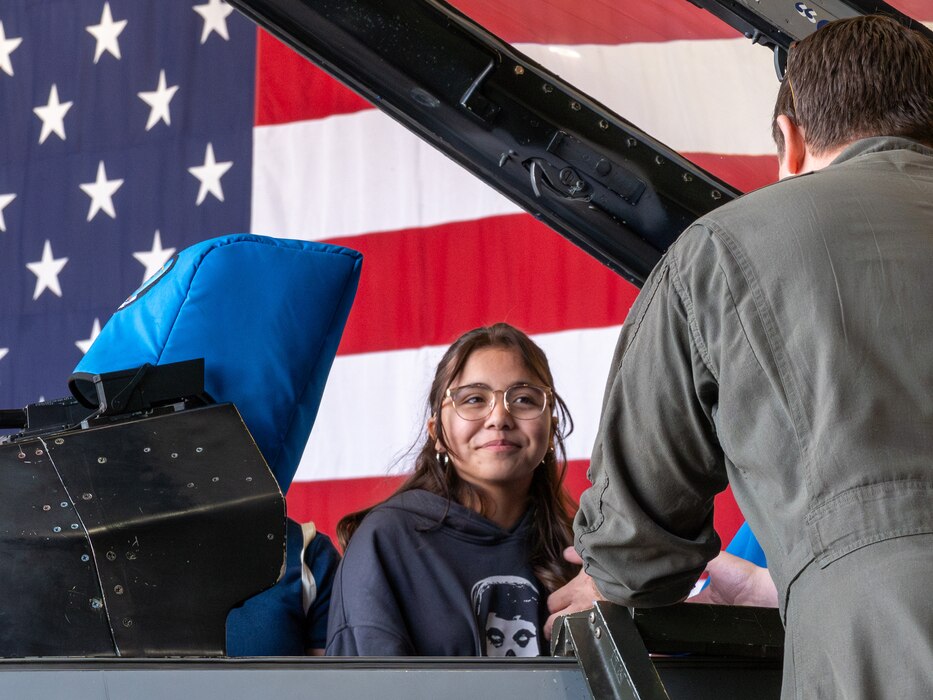 A student from Arthur Hamilton Junior High School meets with a pilot assigned to the 56th Fighter Wing during the Black History Month School Immersion, Feb. 15, 2024, at Luke Air Force Base, Arizona.
