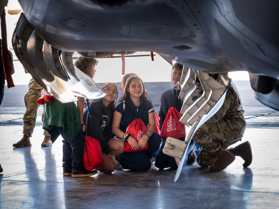 Students from Arthur Hamilton Junior High School take a tour of an F-35 Lightning II assigned the 56th Fighter Wing during the Black History Month School Immersion, Feb. 15, 2024, at Luke Air Force Base, Arizona.
