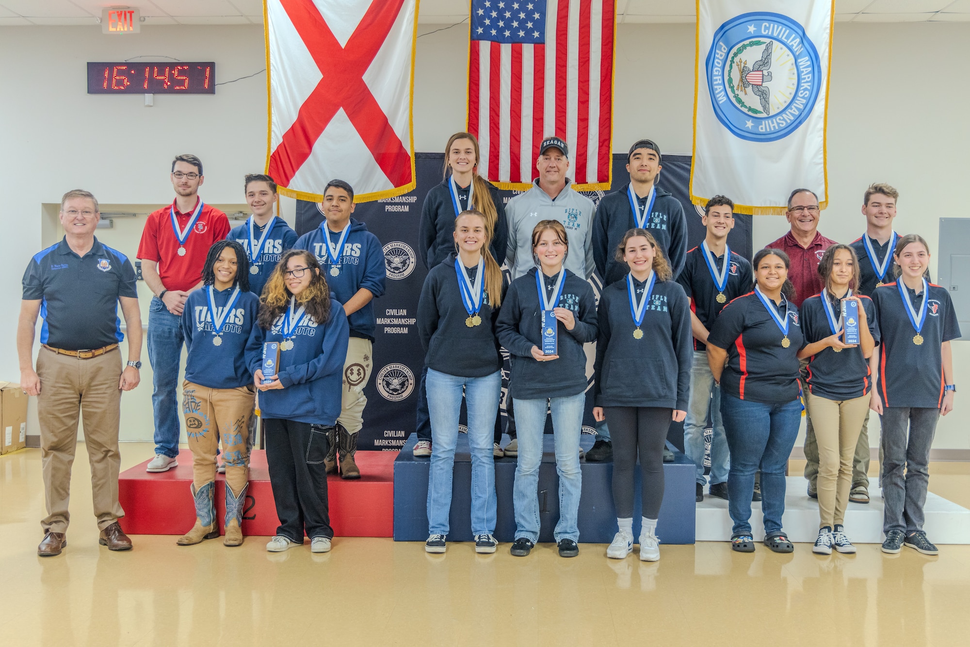 The top three Air Force Junior ROTC teams receive their awards in the Sporter Division at the JROTC Regional Service Championships on Feb. 10, 2024 in Anniston, Ala.