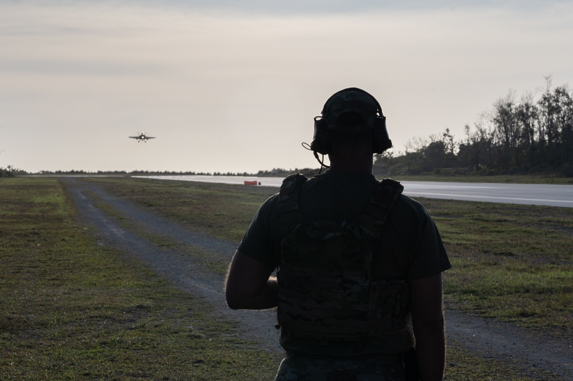 An ATC Airman watches an aircraft land.