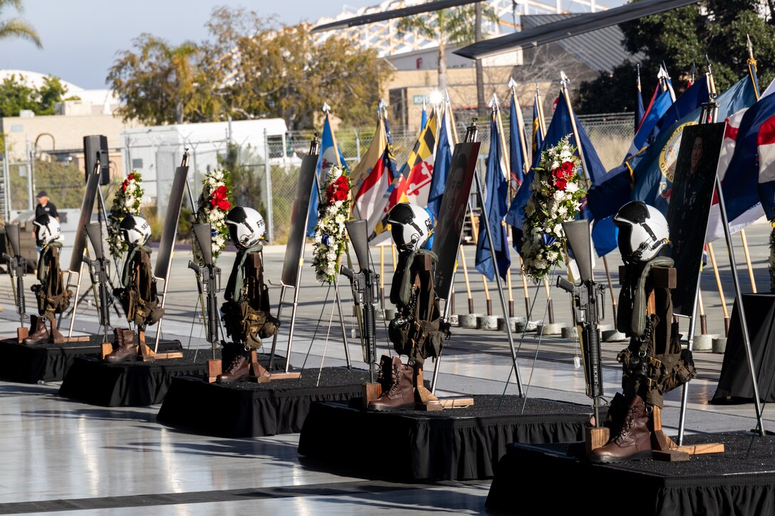 Five battlefield crosses are displayed in honor of five Marines of Marine Heavy Helicopter Squadron (HMH) 361, Marine Aircraft Group 16, 3rd Marine Aircraft Wing, during a memorial ceremony at Marine Corps Air Station Miramar, California, Feb. 16, 2024. More than 550 Marines, family and friends gathered to pay tribute to the five Marines who lost their lives as the result of a CH-53E mishap on Feb. 6, 2024, in Pine Valley, California. (U.S. Marine Corps photo by Staff Sgt. Antonio De La Fuente)