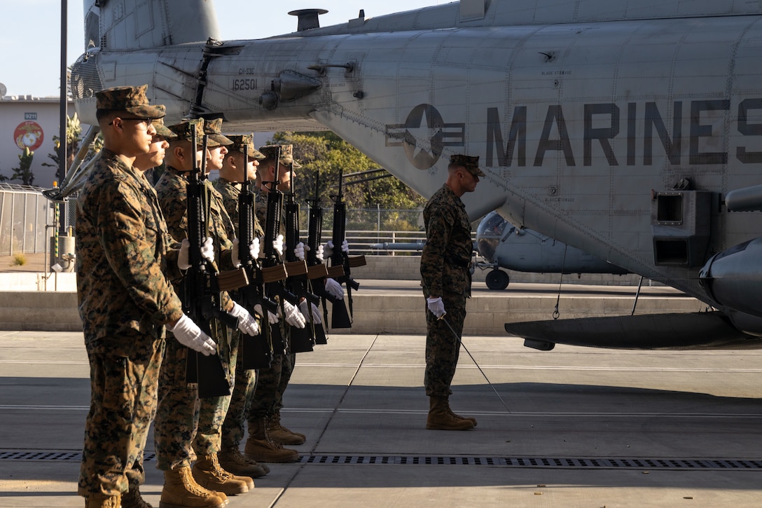 U.S. Marines with Marine Heavy Helicopter Squadron (HMH) 361, Marine Aircraft Group 16, 3rd Marine Aircraft Wing, present arms following the 21-gun salute during a memorial ceremony honoring five Marines of HMH-361 at Marine Corps Air Station Miramar, California, Feb. 16, 2024. More than 550 Marines, family and friends gathered to pay tribute to the five Marines who lost their lives as the result of a CH-53E mishap on Feb. 6, 2024, in Pine Valley, California. (U.S. Marine Corps photo by Staff Sgt. Antonio De La Fuente)