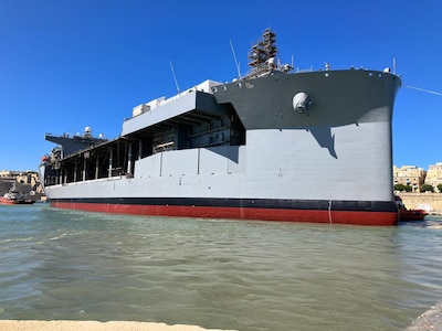 VALLETTA, Malta – The Lewis B. Puller-class expeditionary sea base USS Hershel “Woody” Williams (ESB 4) undocks during its first Regular Overhaul (ROH), a planned maintenance period, in the European area of operations at Palumbo Shipyard Malta. ROHs are routine, planned maintenance periods providing necessary repairs, maintenance and modernization for the ship to operate at full technical capacity and mission capability for its entire designed service life. (U.S. Navy photo)