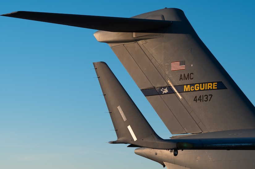 A C-17 Globemaster III sits on the flightline during the Tactics Advancement Course at Joint Base McGuire-Dix-Lakehurst, N.J., Feb. 7, 2024. Airmen assigned to the 6th Airlift Squadron loaded cargo onto the C-17 in order to provide support for the F-22 Raptors at Joint Base Langley-Eustis, Va. The advancements course postures Air Mobility Command Airmen to execute agile operations on a global scale. (U.S. Air Force photo by Airman 1st Class Aidan Thompson)