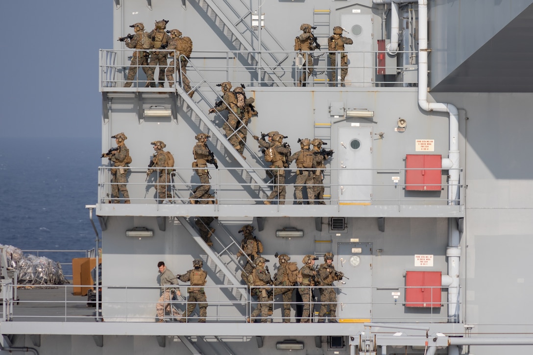 U.S. Marines with the maritime raid force, 31st Marine Expeditionary Unit, conduct a visit, board, search, and seizure exercise aboard the USS Miguel Keith, in the Philippine Sea, Feb. 11, 2024. VBSS is part of maritime interception operations that aim to delay, disrupt, or destroy enemy forces or supplies in the maritime domain. The 31st MEU is operating aboard ships of the America Amphibious Ready Group in the 7th Fleet area of operations to enhance interoperability with allies and partners and serve as a ready response force to defend peace and stability in the Indo-Pacific region.