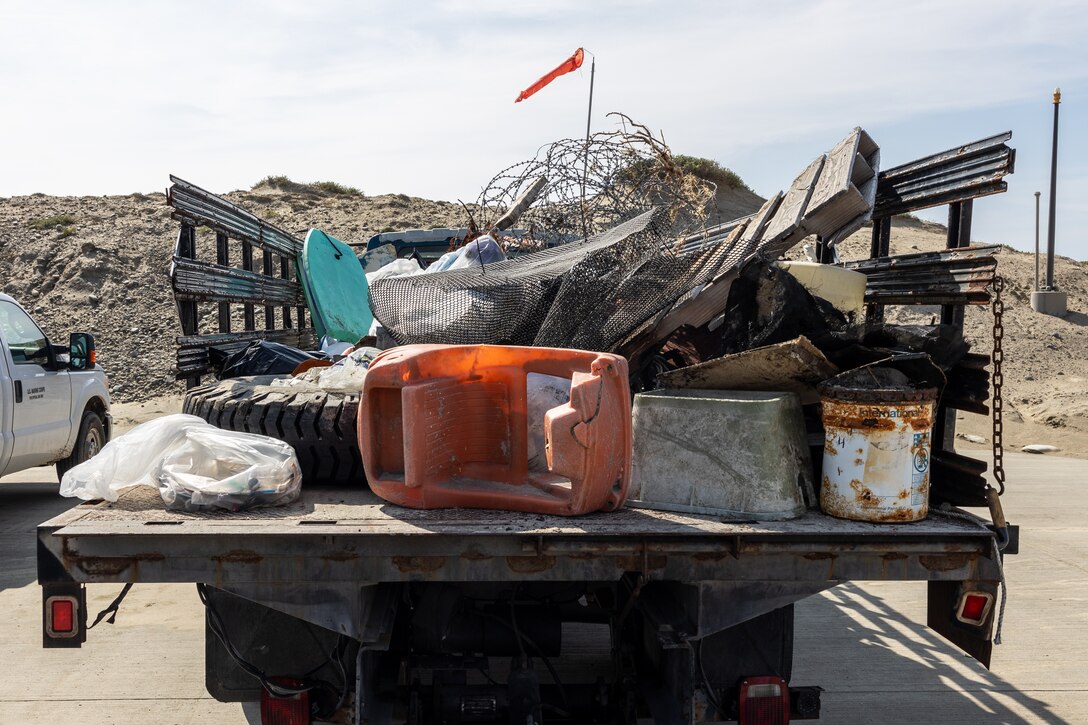 Trash is piled up on a truck during a beach cleanup at White Beach at Marine Corps Base Camp Pendleton, California, Feb. 16, 2024. This cleanup allows MCB Camp Pendleton and its tenant units to conduct preservation efforts while harmonizing environmental efficacy and military readiness. MCB Camp Pendleton takes active steps to preserve regional wildlife and natural resources while providing the Fleet Marine Force with the training spaces necessary to meet training and readiness requirements. (U.S. Marine Corps photo by Lance Cpl. Watts)
