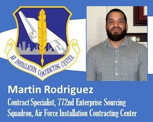 Photo of Rodriguez with AFICC unit shield