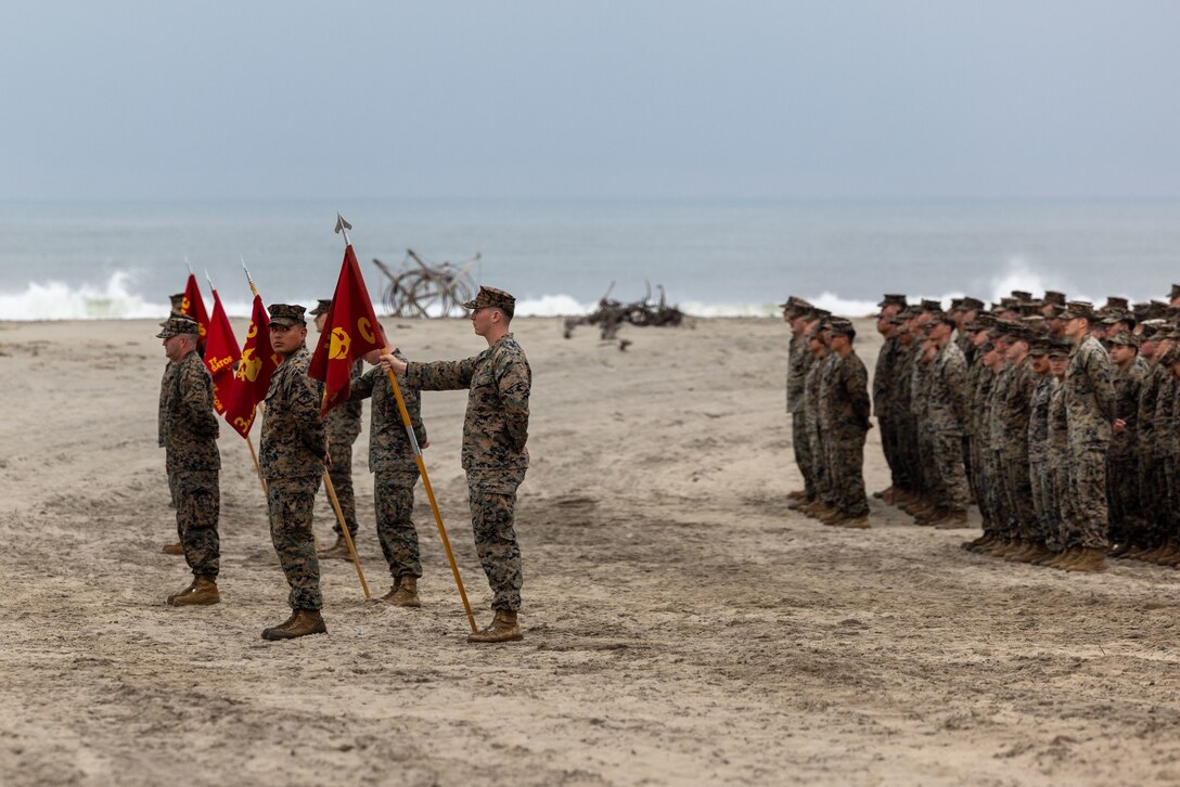 U.S. Marines with 3rd Assault Amphibian Battalion, 1st Marine Division, hold a formation before a beach cleanup at Blue Beach, at Marine Corps Base Camp Pendleton, California, Feb. 16, 2024. This cleanup allows MCB Camp Pendleton and its tenant units to conduct preservation efforts while harmonizing environmental efficacy and military readiness. MCB Camp Pendleton takes active steps to preserve regional wildlife and natural resources while providing the Fleet Marine Force with the training spaces necessary to meet training and readiness requirements. (U.S. Marine Corps Photo by Lance Cpl. Espitia)
