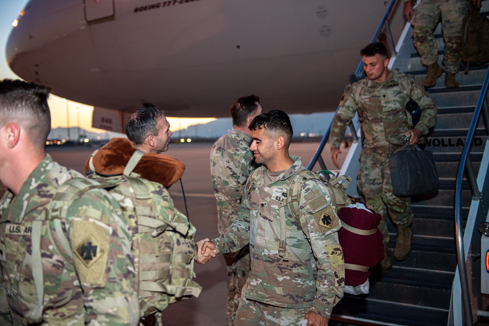 Members of Task Force Tomahawk arrive at Fort Bliss, Texas, Feb. 18, 2024, for demobilization following a nine-month deployment to the Horn of Africa. Task Force Tomahawk is made up of units of the 45th Infantry Brigade Combat Team - primarily of the 1st Battalion, 179th Infantry Regiment as well as companies from the 1st Battalion, 279th Infantry Regiment and 2nd Battalion, 134th Infantry Regiment (Airborne). TF Tomahawk was responsible for security at multiple locations across several countries in the Horn of Africa as well as manning the East African Response Force. (Oklahoma National Guard photo by Anthony Jones)