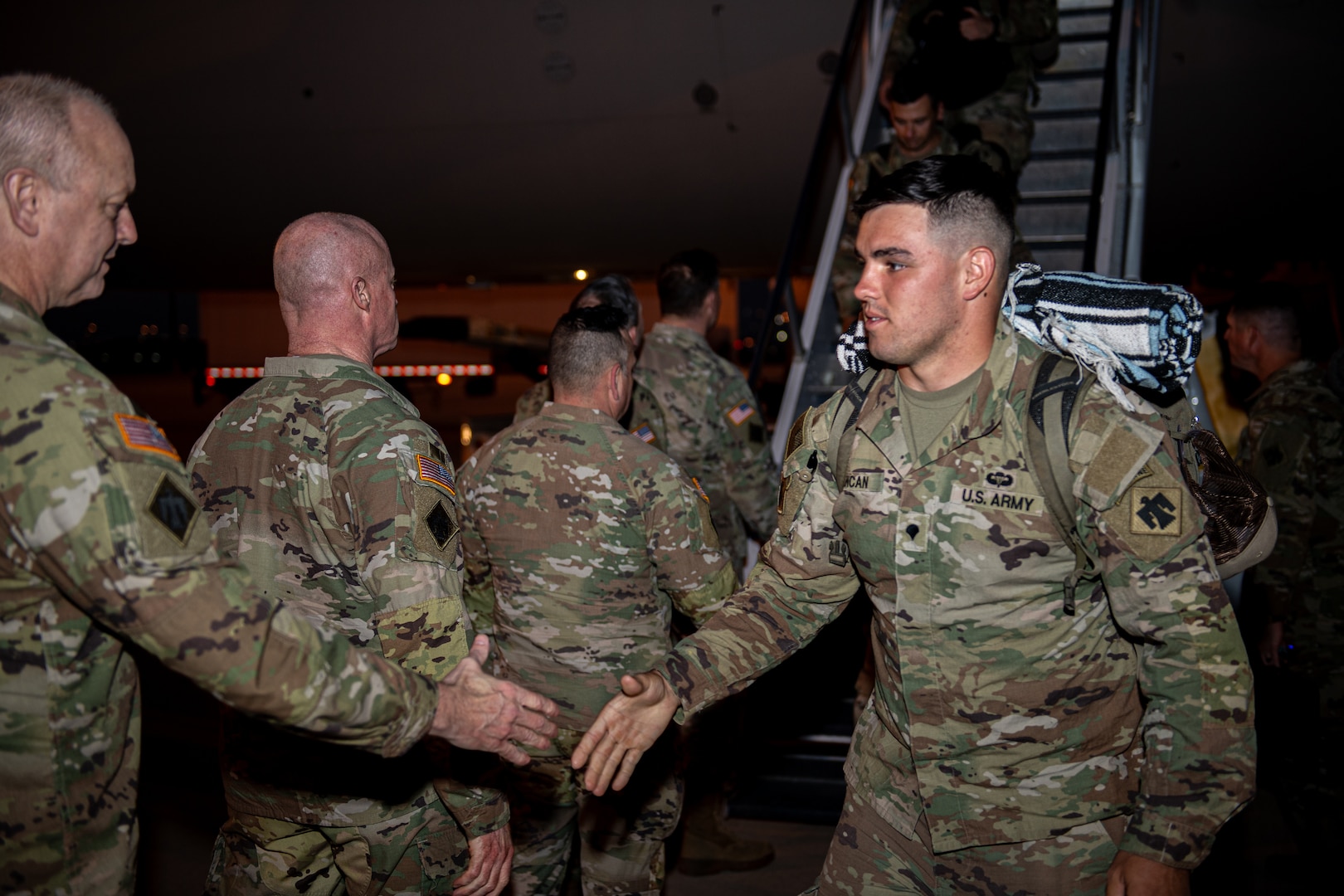 Members of Task Force Tomahawk arrive at Fort Bliss, Texas, Feb. 18, 2024, for demobilization following a nine-month deployment to the Horn of Africa. Task Force Tomahawk is made up of units of the 45th Infantry Brigade Combat Team - primarily of the 1st Battalion, 179th Infantry Regiment as well as companies from the 1st Battalion, 279th Infantry Regiment and 2nd Battalion, 134th Infantry Regiment (Airborne). TF Tomahawk was responsible for security at multiple locations across several countries in the Horn of Africa as well as manning the East African Response Force. (Oklahoma National Guard photo by Anthony Jones)
