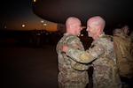 Lt. Col. Brent Weece, commander, Task Force Tomahawk, (right) shakes hands with Lt. Col. Micheal Scanlon, state operations officer, Oklahoma Army National Guard at Fort Bliss, Texas, Feb. 18, 2024, after Weece returns from a nine-month deployment to the Horn of Africa. Task Force Tomahawk is made up of units of the 45th Infantry Brigade Combat Team - primarily of the 1st Battalion, 179th Infantry Regiment as well as companies from the 1st Battalion, 279th Infantry Regiment and 2nd Battalion, 134th Infantry Regiment (Airborne). TF Tomahawk was responsible for security at multiple locations across several countries in the Horn of Africa as well as manning the East African Response Force. (Oklahoma National Guard photo by Anthony Jones)
