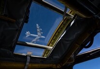 A B-52H Stratofortress assigned to the 23rd Bomb Squadron flies above another B52-H over the Pacific Ocean, Feb. 12, 2024. Bomber Task Force missions enhance the readiness and training necessary to respond to any potential crisis or challenge worldwide. (U.S. Air Force photo by Airman 1st Class Alyssa Bankston)