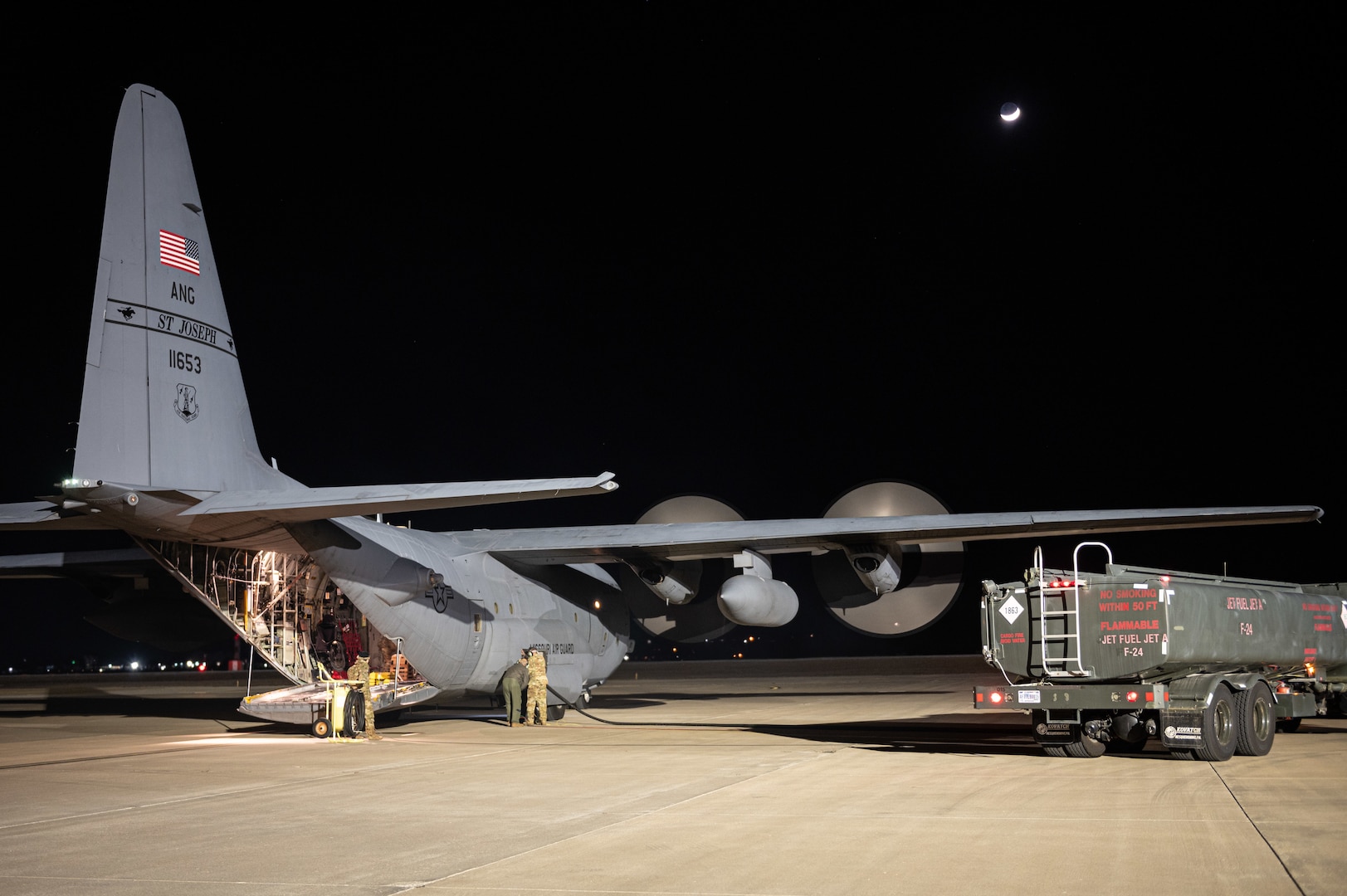 Airmen assigned to the 139th Airlift Wing, Missouri Air National Guard, refuel a C-130H Hercules aircraft Feb. 13, 2024, at Rosecrans Air National Guard Base, St. Joseph, Missouri. Aircrews conducted a 41-hour sortie in which the aircraft engines ran continuously for 45 hours and the aircraft was refueled three times.