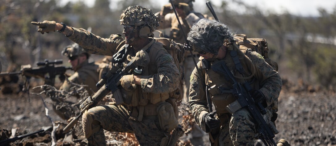 U.S. Marines with 3d Littoral Combat Team, 3d Marine Littoral Regiment, 3d Marine Division, conduct company attacks during exercise Bougainville III at Pohakuloa Training Area, Feb. 7, 2024. Bougainville III is a 3d LCT live-fire exercise focused on decentralized operations to prepare the battalion to command and control forces from dispersed locations. (U.S. Marine Corps photo by Lance Cpl. Clayton Baker)