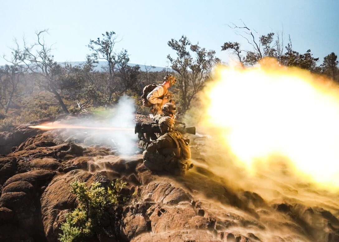 U.S. Marines with 3d Littoral Combat Team, 3d Marine Littoral Regiment, 3d Marine Division, fire an M3E1 Multi-purpose Anti-armor Anti-personnel Weapon System for company attacks during exercise Bougainville III at Pohakuloa Training Area, Feb. 10, 2024. Bougainville III is a 3d LCT live-fire exercise focused on decentralized operations to prepare the battalion to command and control forces from dispersed locations. (U.S. Marine Corps photo by Sgt. Grace Gerlach)