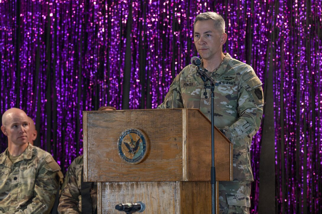 U.S. Army Lt. Col. Erik Ponzek, Task Force Paxton commander, welcomes his Soldiers to Combined Joint Task Force - Horn of Africa during a transfer of authority ceremony at Camp Lemonnier, Djibouti Feb. 10, 2024. Soldiers from Task Force Tomahawk relinquished command security forces to Task Force Paxton. (U.S. Army National Guard photo by Sgt. Jalen Miller)