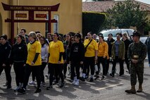U.S. Marine Corps Sgt. David Plummer, a drill instructor with Support Battalion, Recruit Training Regiment, instructs spouses taking part in the "In Their Boots" event on close order drill at Marine Corps Recruit Depot San Diego, Feb. 16, 2024. In Their Boots is designed to inform Marine Corps spouses about the duties of their significant others and give them a peek into the rigors of recruit training. (U.S. Marine Corps photo by Sgt. Jesse K. Carter-Powell)