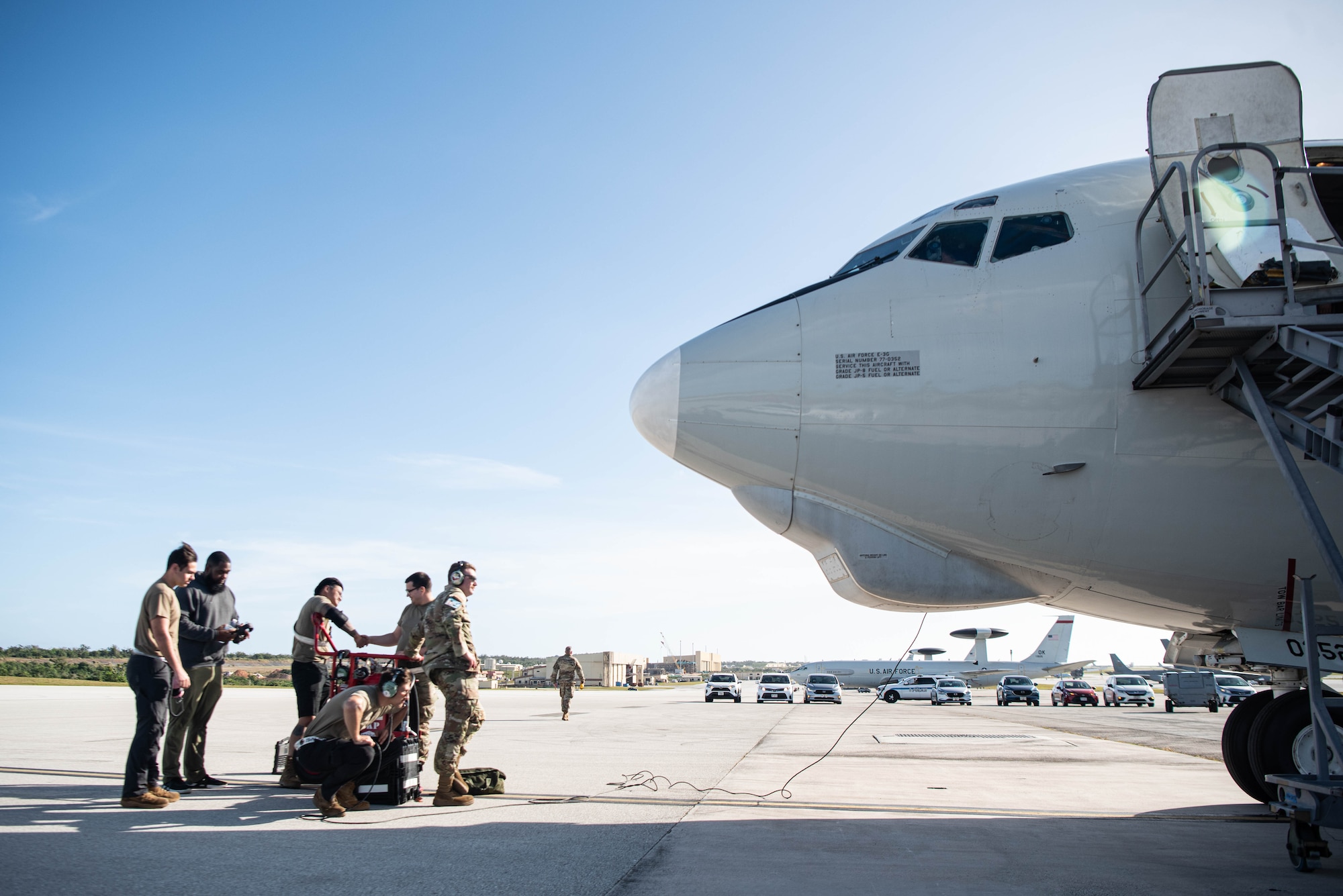 Airmen discuss pre-flight procedures.