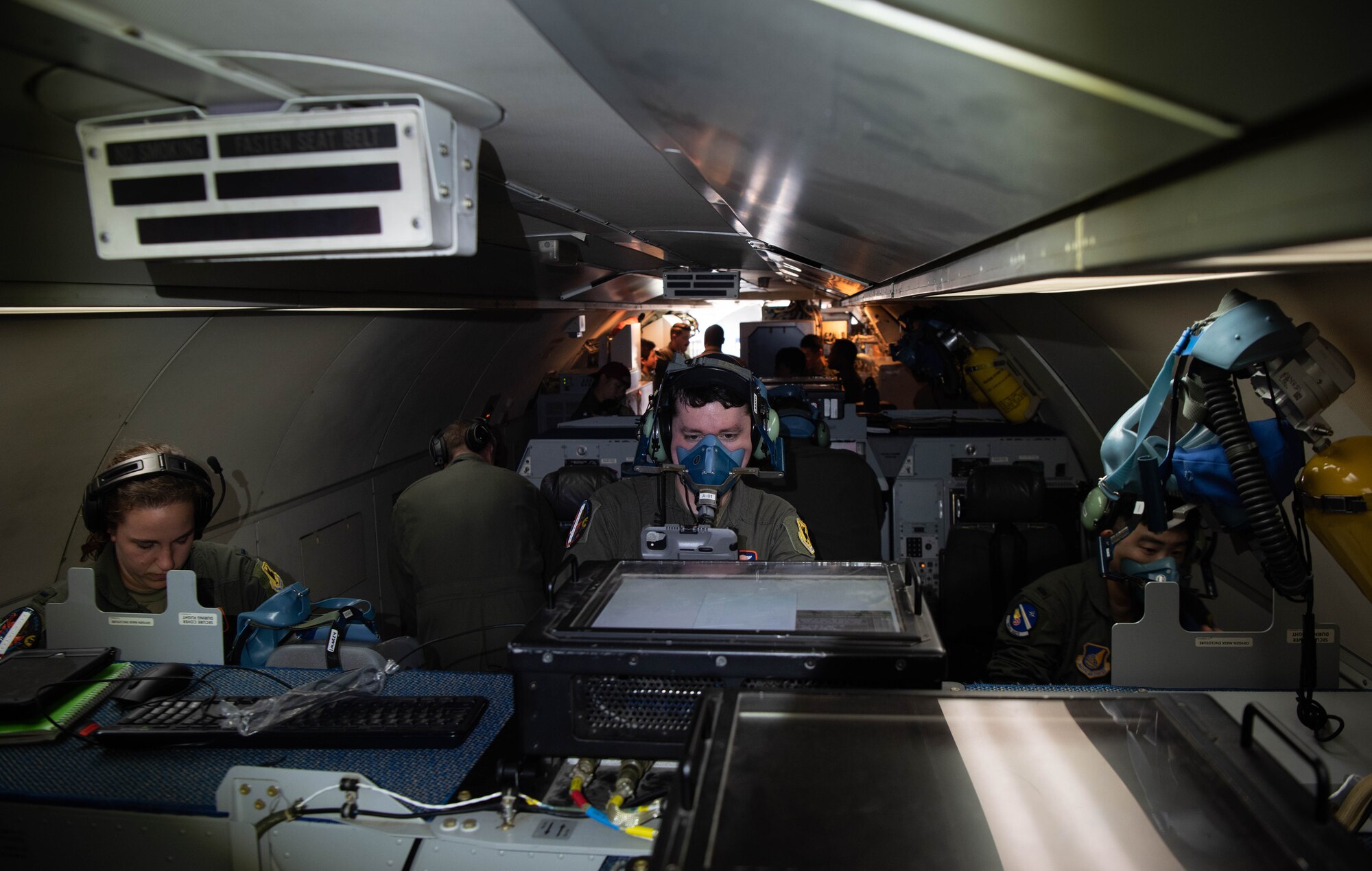 Airmen conduct pre-flight procedures.