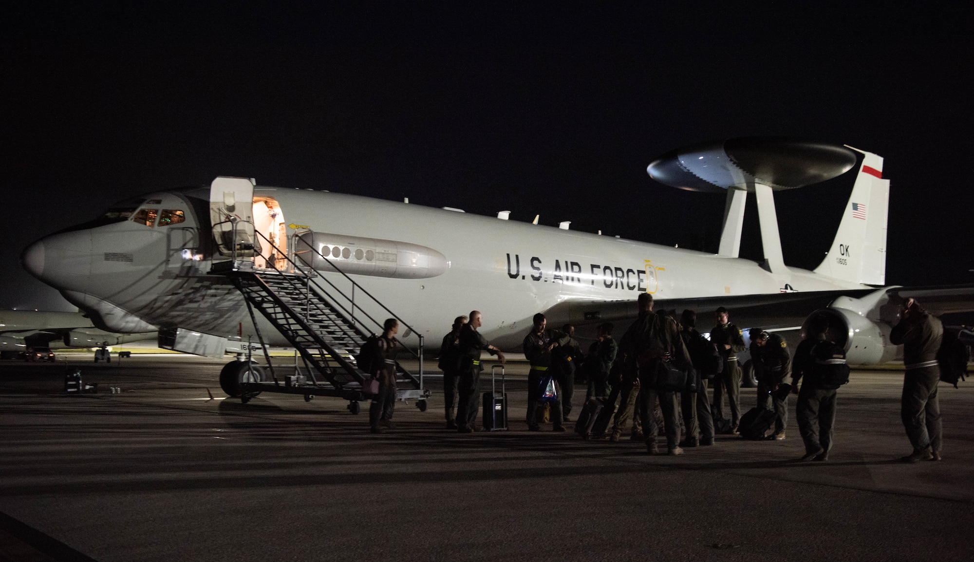 Airmen deplane after a flight.