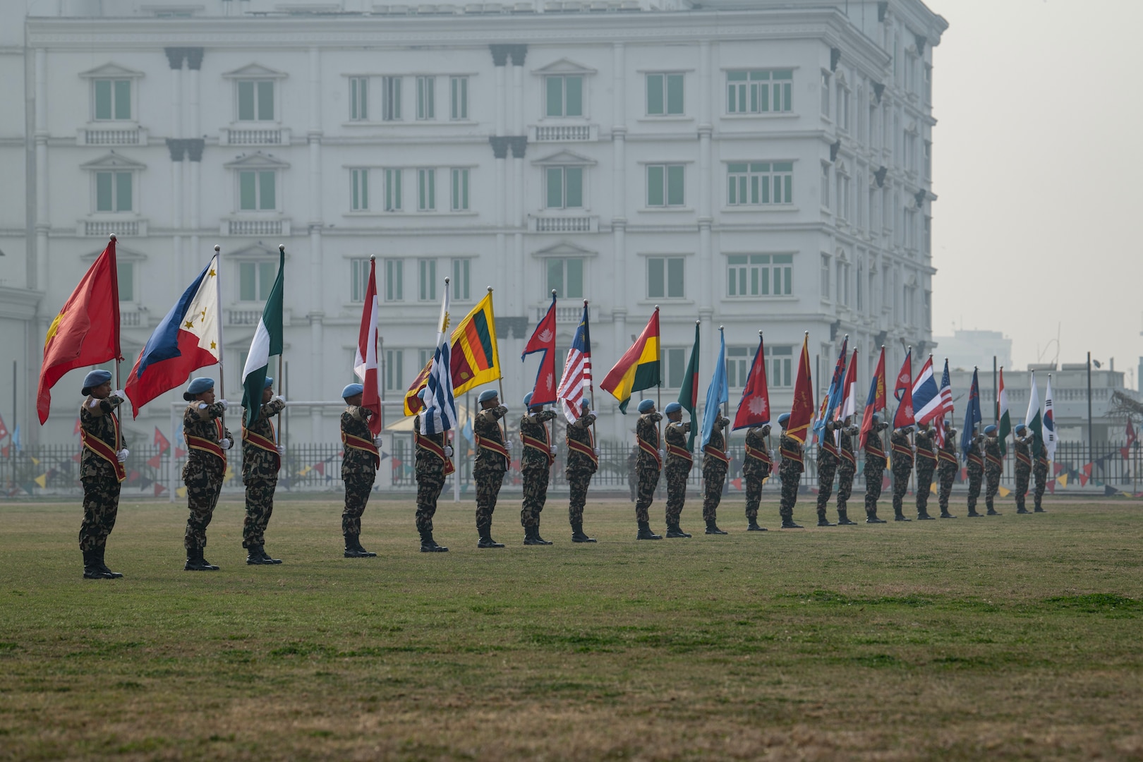 Combined service members from 19 countries participate in the opening ceremony of Exercise Shanti Prayas IV, a Multinational Peacekeeping Exercise, at the Nepali Army Headquarters on Feb. 20, 2024. Shanti Prayas IV is a multinational peacekeeping exercise sponsored by the Nepali Army and U.S. Indo-Pacific Command and is the latest in a series of exercises designed to support peacekeeping operations. (U.S. Marine Corps photo by Lance Cpl John Hall)