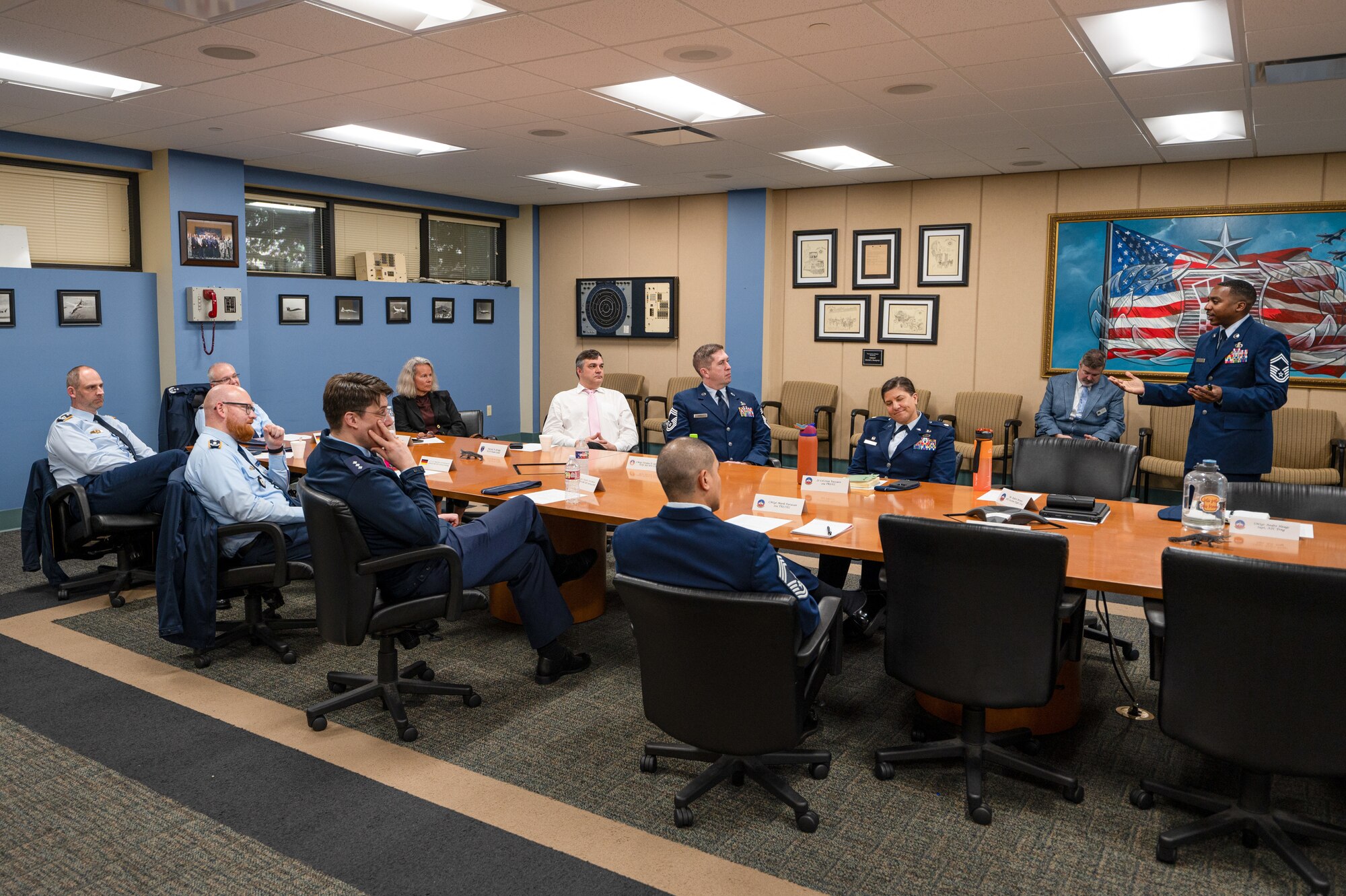 U.S. Air Force Senior Master Sgt. Andre Heags, 334th Training Squadron air traffic control training superintendent, briefs members of the German Military Aviation Authority on Keesler Air Force Base, Mississippi, Feb. 12, 2024.