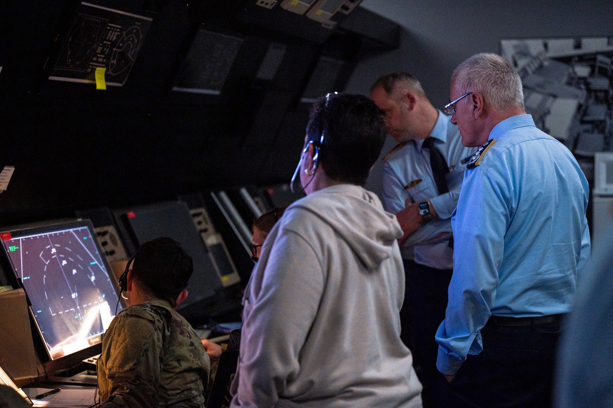 Members of the German Military Aviation Authority observe students assigned to the 334th Training Squadron working in the simulated radar control room on Keesler Air Force Base, Mississippi, Feb. 12, 2024.