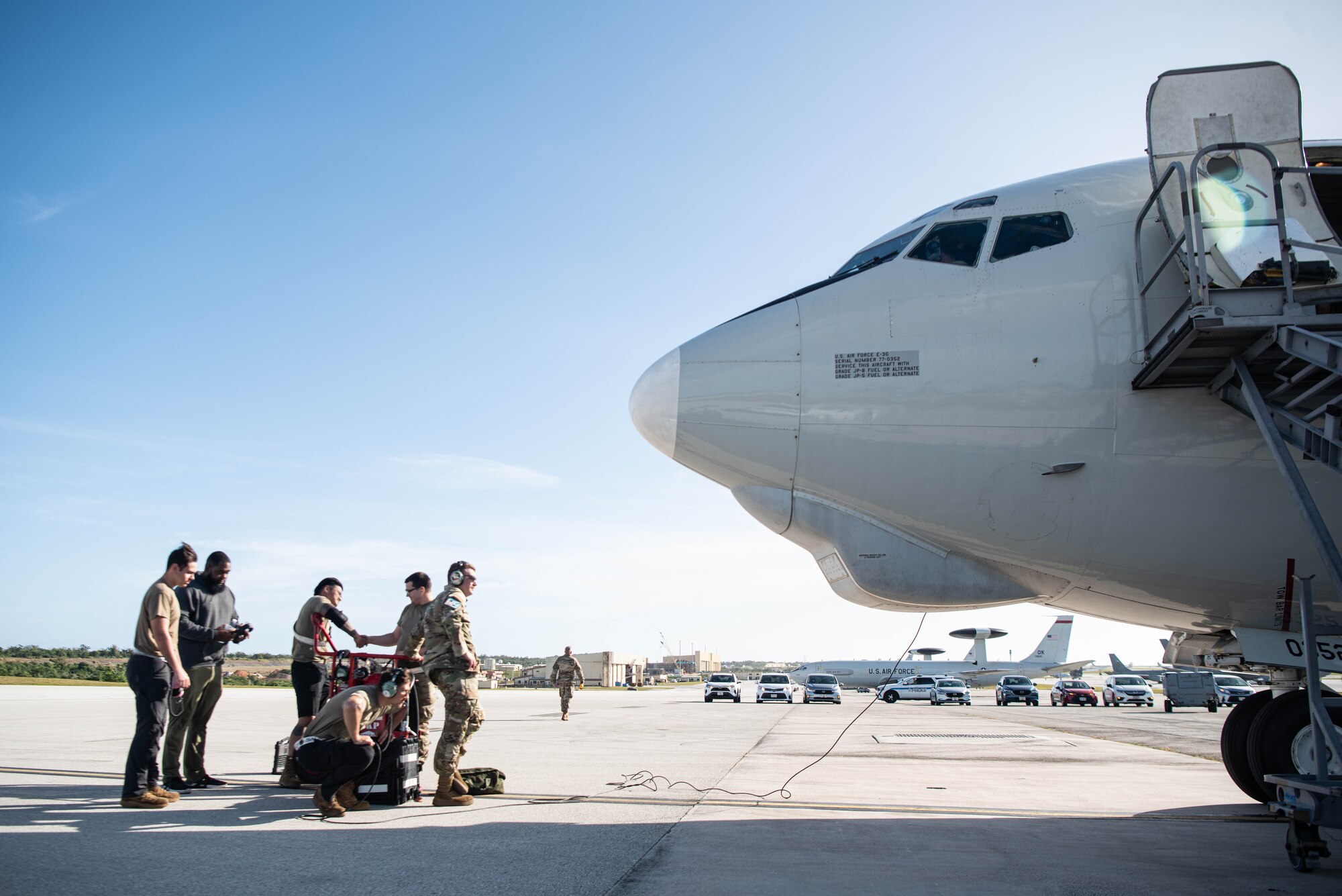 Airmen discuss pre-flight procedures.
