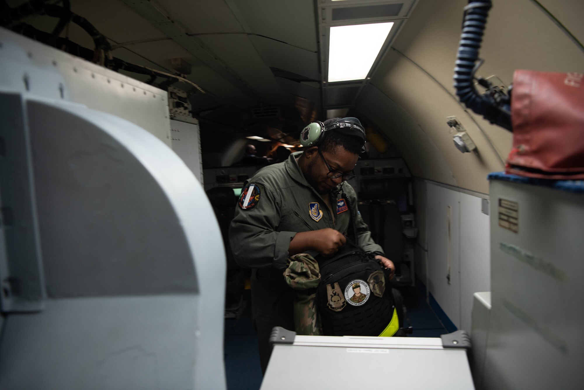 An Airman packs up after a flight.
