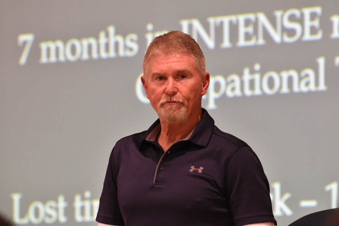 Lee Shelby stands in front of a group of Marines at Combined Arms Training Center, Camp Fuji, Japan, during one of his presentations, February 16, 2024. (U.S. Marine Corps photo by Song Jordan)