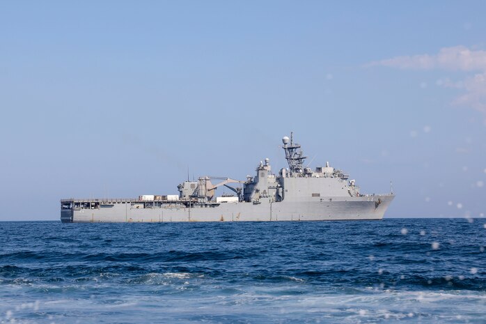 230813-N-JO162-1125 ATLANTIC OCEAN (Aug. 13, 2023) Amphibious dock landing ship USS Gunston Hall (LSD 44) steams into position to pick up small craft during Large Scale Exercise 2023 (LSE 2023). LSE 2023 demonstrates the Navy’s and Marine Corps’ ability to employ precise, lethal and overwhelming force globally across six maritime component commands, seven numbered fleets, and 22 time zones. LSE 2023 merges real-world operations with virtually constructed scenarios to create a realistic training environment that allows Sailors and Marines to train how they will fight, regardless of geographic boundaries