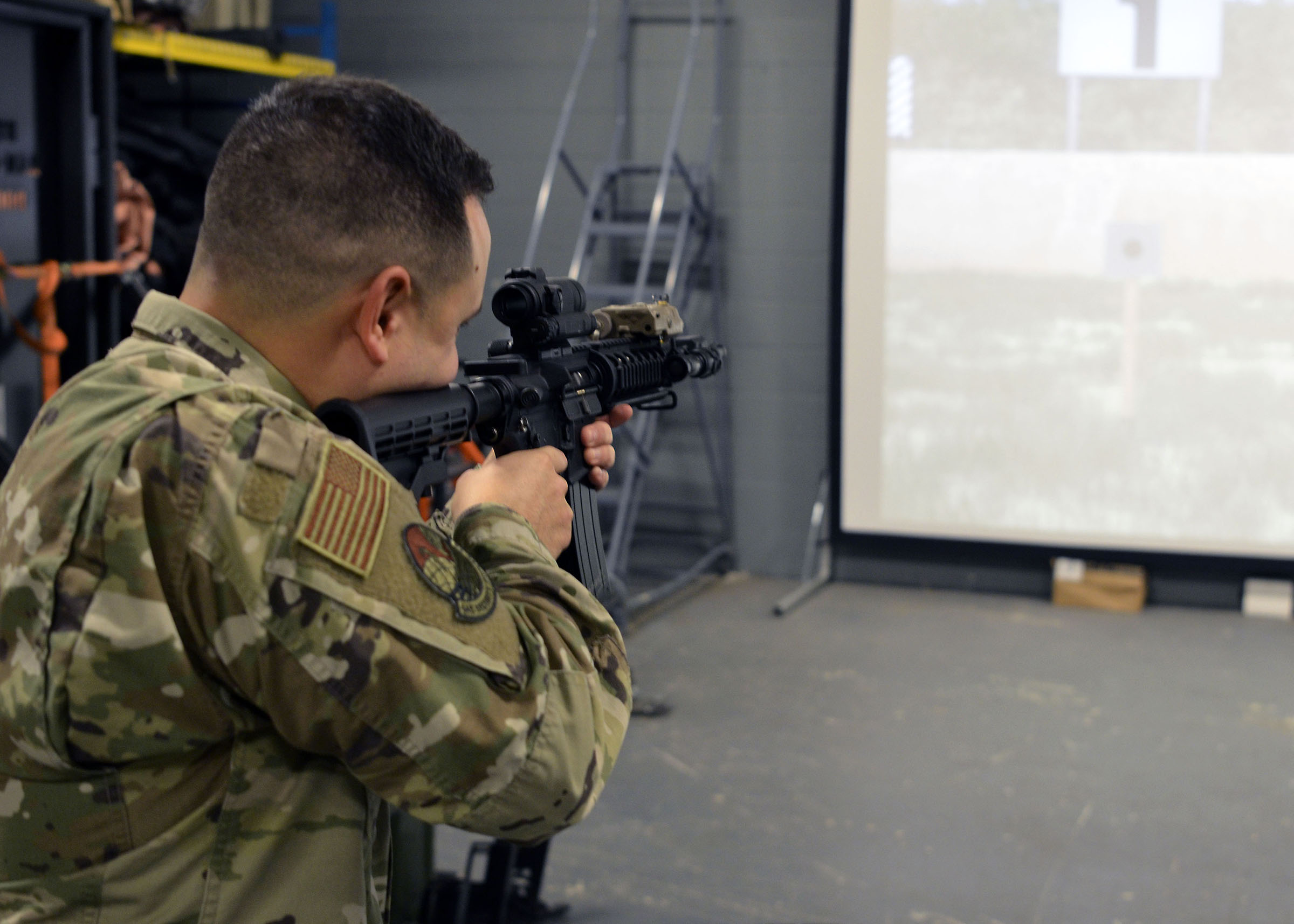 Staff Sgt. Tyler Acevedo, 445th Security Forces Squadron fire team leader, engages targets during virtual marksmanship training at Wright-Patterson Air Force Base, Ohio, Jan. 6,
2024. (U.S. Air Force photo/Staff Sgt. Ethan Spickler)