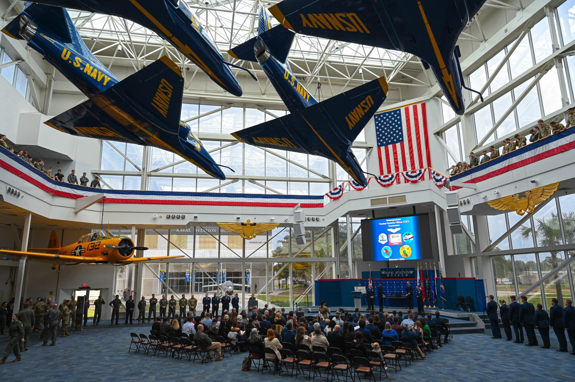The 479th Flying Training Group hosts its Undergraduate Combat Systems Officers Course graduation ceremony at the National Naval Aviation Museum, Naval Air Station Pensacola, Fla., Feb. 16, 2024. The 479th Flying Training Group conducts Combat Systems Officer training for newly commissioned U.S. Air Force officers. (U.S. Air Force photo by Capt. Benjamin Aronson)