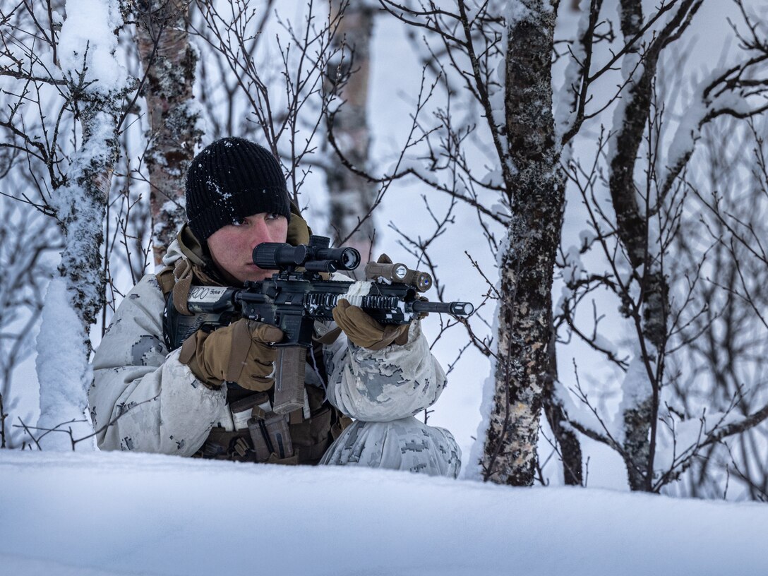 U.S. Marine Corps Private First Class. Brandon Pardo, a rifleman with 1st Battalion, 2nd Marine Regiment, 2nd Marine Division, practices security tactics during Cold Weather Training in preparation for the NATO exercise Nordic Response 2024 in Setermoen, Norway, Feb. 7, 2024. Nordic Response is a Norwegian national readiness and defense exercise designed to enhance military capabilities and allied cooperation in high-intensity warfighting in a challenging arctic environment. This exercise will test military activities ranging from the reception of allied and partner reinforcements and command and control interoperability to combined joint operations, maritime prepositioning force logistics, integration with NATO militaries, and reacting against an adversary force during a dynamic training environment. The U.S. stands firm in commitment and readiness to support Norway, allies and partners. (U.S. Marine Corps photo by Cpl. Joshua Kumakaw)
