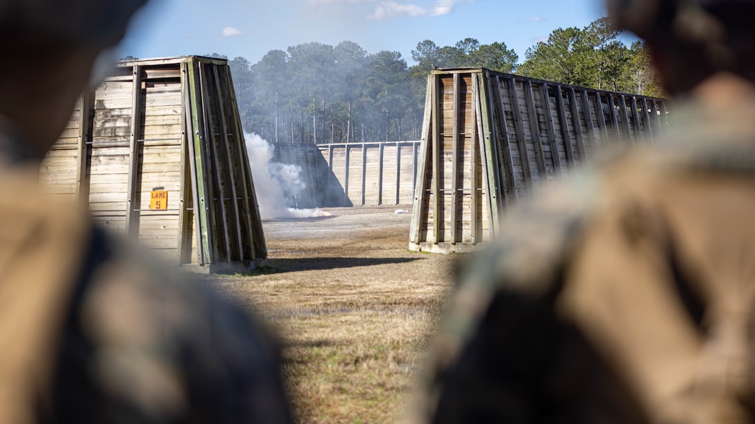 U.S. Marines with 2nd Marine Logistics Group and 2nd Marine Division watch as thermite is lit during a basic demolition range on Camp Lejeune, North Carolina, Feb. 13, 2024. The training exposed 2nd MLG and 2nd Marine Division Marines to the EOD program, enhancing their baseline understanding of EOD and generate interest as potential lateral move candidates . (U.S. Marine Corps photo by Cpl. Alfonso Livrieri)