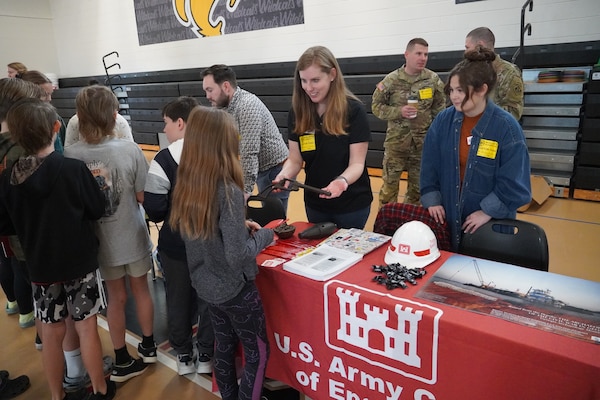 Andrea Farmer, U.S. Army Corps of Engineers, Savannah District, archeologist, presents archeological artifacts recovered from the Savannah River to students at McAllister Elementary School during the school’s ninth annual career day, in Richmond Hill, Georgia, Feb. 9, 2024.