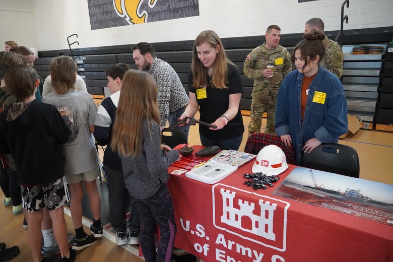 Andrea Farmer, U.S. Army Corps of Engineers, Savannah District, archeologist, presents archeological artifacts recovered from the Savannah River to students at McAllister Elementary School during the school’s ninth annual career day, in Richmond Hill, Georgia, Feb. 9, 2024.