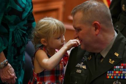 All Rise: Married Army JAG officers promoted together during joint ceremony