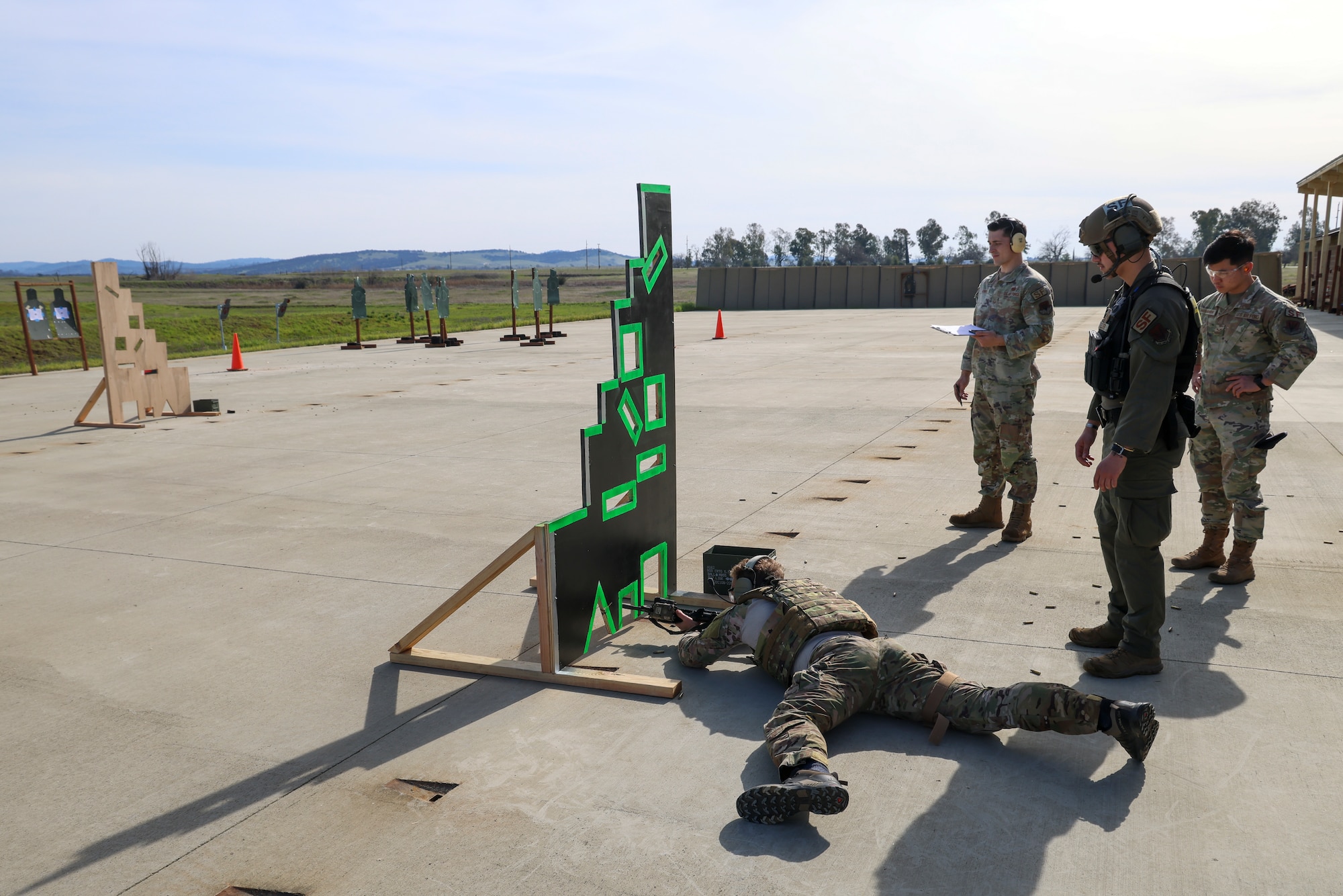 U.S. Air Force Capt. John Rossi, 605th Test and Evaluation Squadron, Detachment 3 intelligence fusion officer in charge, fires an M4A1 Carbine during the shooting qualification of the Tactical Response Team (TRT) tryouts Feb. 12, 2024, at Beale Air Force Base, California.