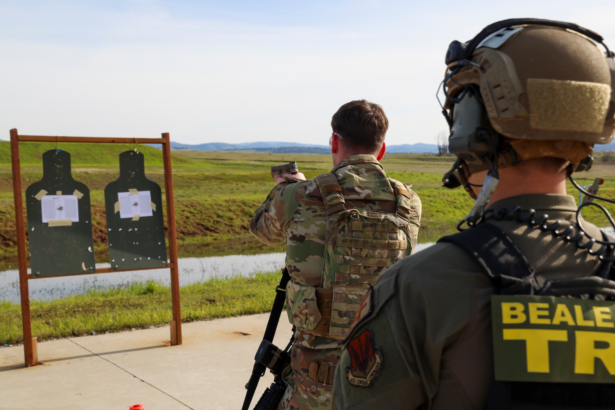 U.S. Air Force Senior Airman Noah Appelgren, 9th Reconnaissance Wing command post senior emergency actions controller, fires a Sig Sauer M18 during the shooting qualification of the Tactical Response Team (TRT) tryouts Feb. 12, 2024, at Beale Air Force Base, California.