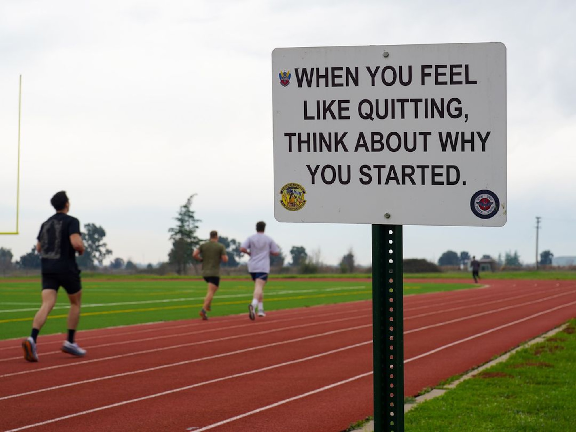 United States Air Force Airmen perform a timed one-mile run during the physical fitness qualification of the Tactical Response Team (TRT) tryouts Jan. 31, 2024, at Beale Air Force Base, California.