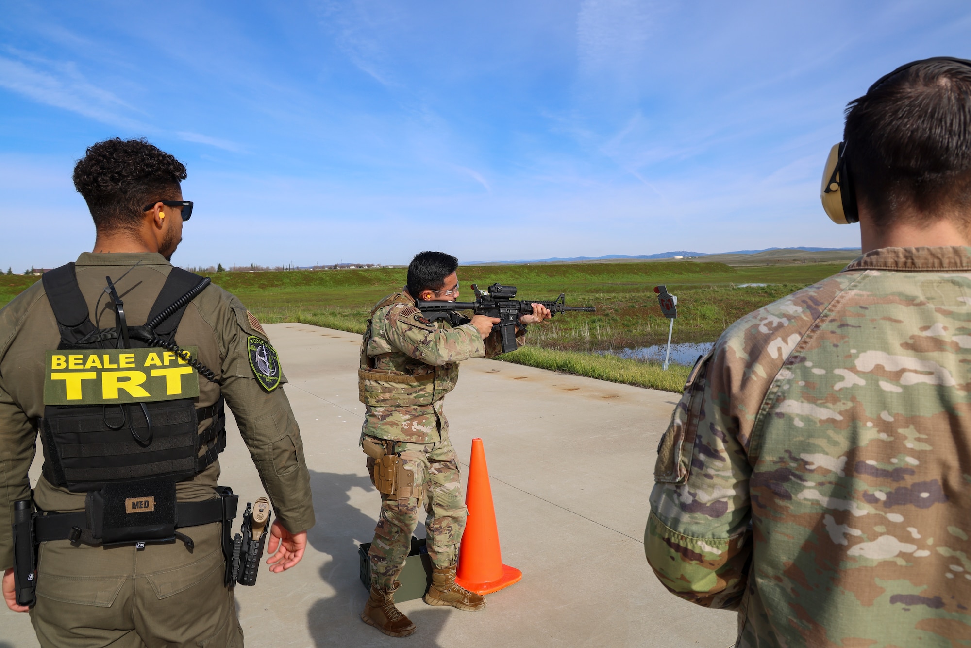 U.S. Air Force Senior Airman Justin Jimenez, 553rd Intelligence Squadron all source analyst, fires an M4A1 Carbine during the shooting qualification of the Tactical Response Team (TRT) tryouts Feb. 12, 2024, at Beale Air Force Base, California.